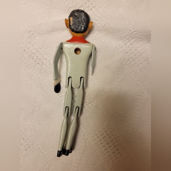 Charming Wooden Puppet with Red and Black Details